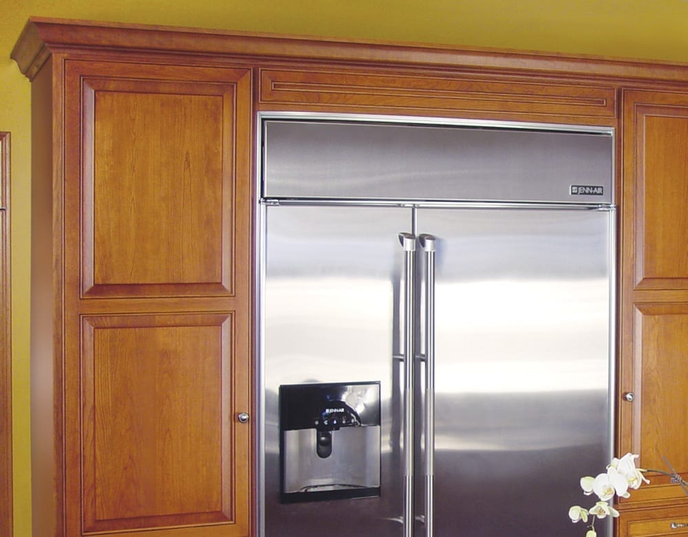 Kitchen with crown molding after cabinet refacing by American Wood Reface