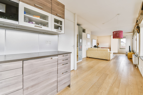 light painted kitchen in white oaked wood kitchen cabinet