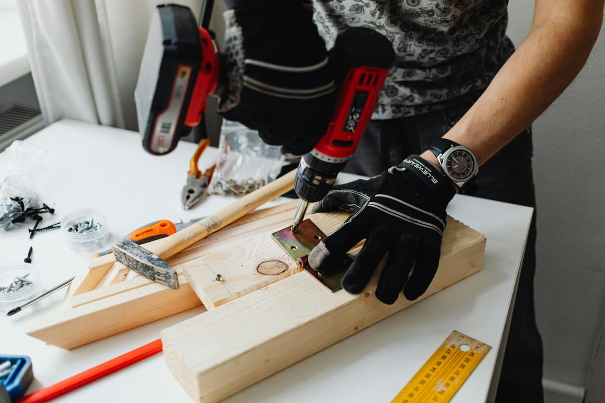 Putting of Hinge on a Wood
